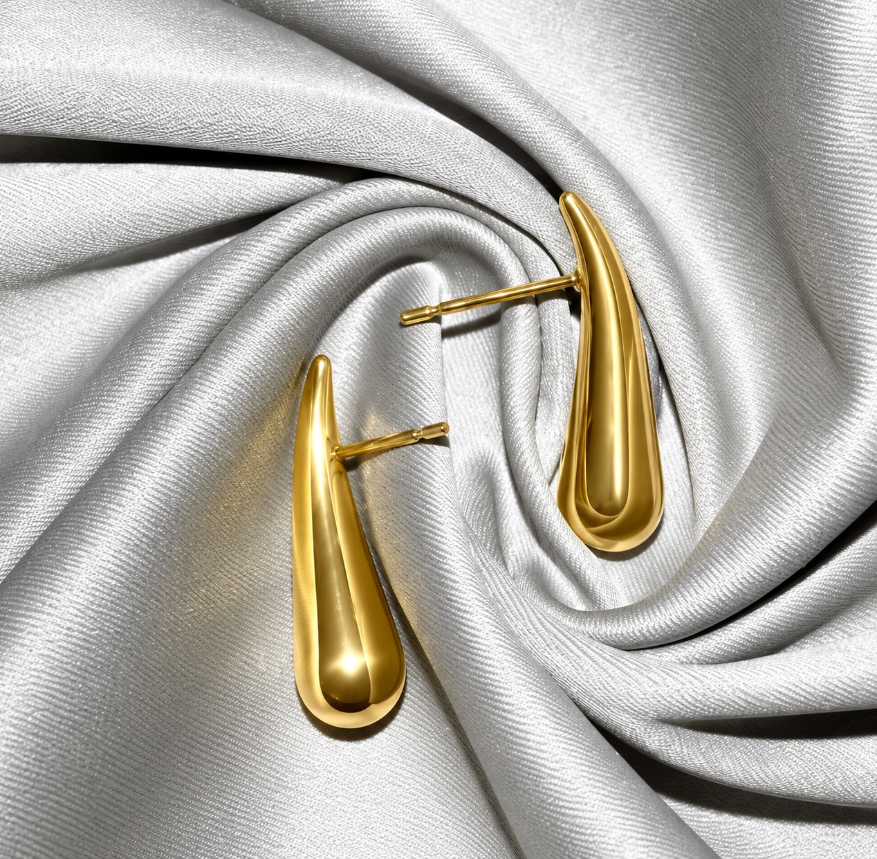 Gold comma stud earrings